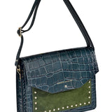 MARIELA GRABADO Bolso de piel de cocodrilo y suede en color verde oscuro con correa decorado con tachuelas. Es un bolso estilo bandolera y de hombro - SANDRA FRECKLED bolsos de mujer